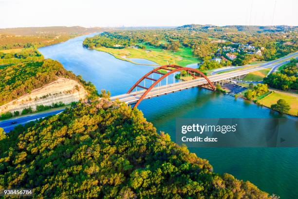 pennybacker 360 bridge, colorado river, austin texas, aerial panorama - austin texas aerial stock pictures, royalty-free photos & images