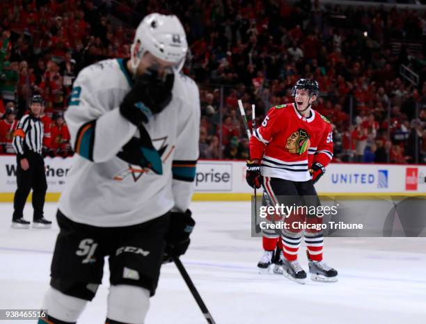 Chicago Blackhawks defenseman Connor Murphy , right, reacts after his goal against the San Jose Sharks during the first period of their game at the...