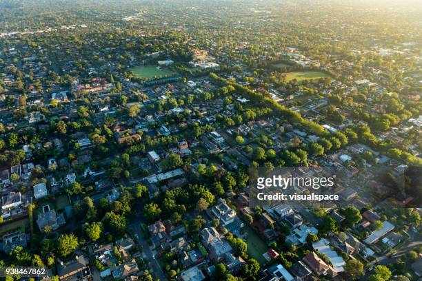 melbourne suburb in the sunrise - aerial view stock pictures, royalty-free photos & images
