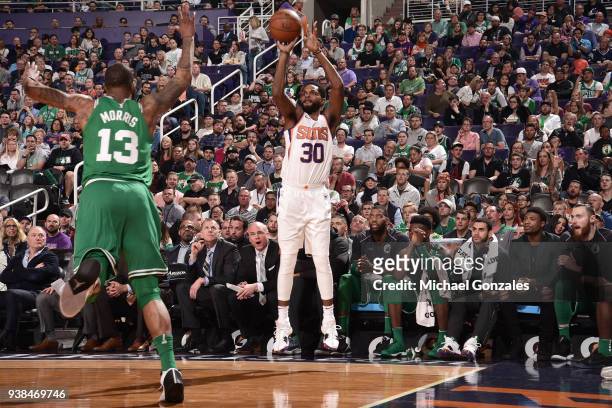 Troy Daniels of the Phoenix Suns shoots the ball against the Boston Celtics on March 26, 2018 at Talking Stick Resort Arena in Phoenix, Arizona. NOTE...