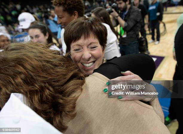 Head coach Muffet McGraw of the The Notre Dame Fighting Irish is congratulated after defeating the Oregon Ducks 84-74 in the 2018 NCAA Division 1...