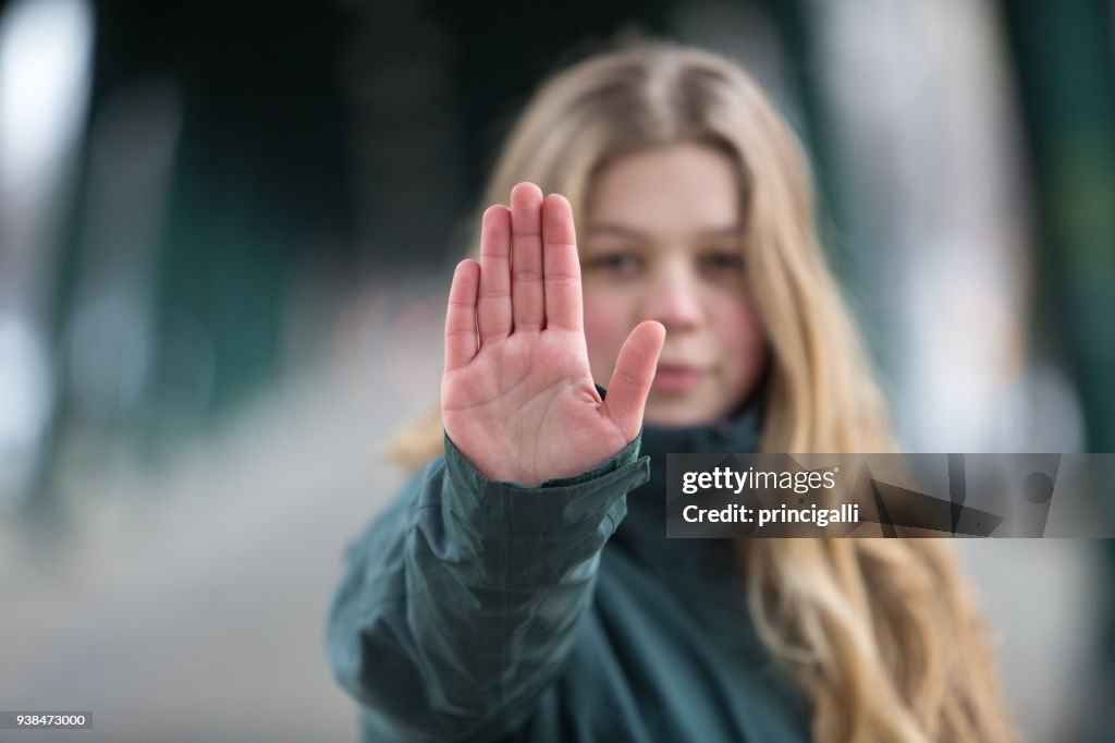 Woman making stop gesture