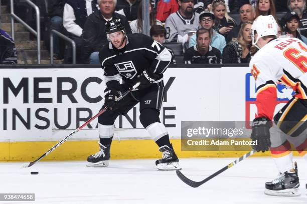 Torrey Mitchell of the Los Angeles Kings handles the puck during a game against the Calgary Flames at STAPLES Center on March 26, 2018 in Los...