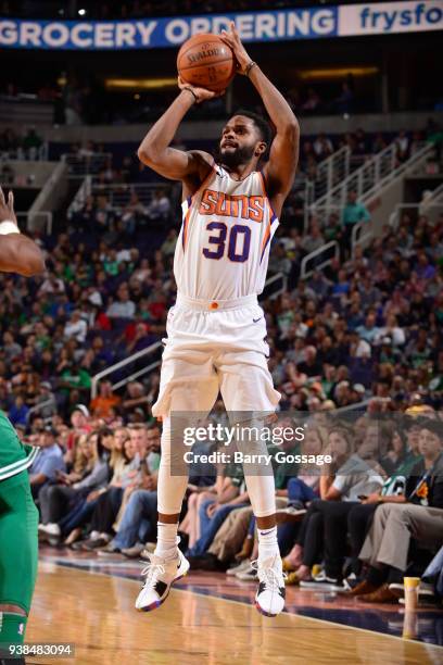 Troy Daniels of the Phoenix Suns shoots the ball against the Boston Celtics on March 26, 2018 at Talking Stick Resort Arena in Phoenix, Arizona. NOTE...