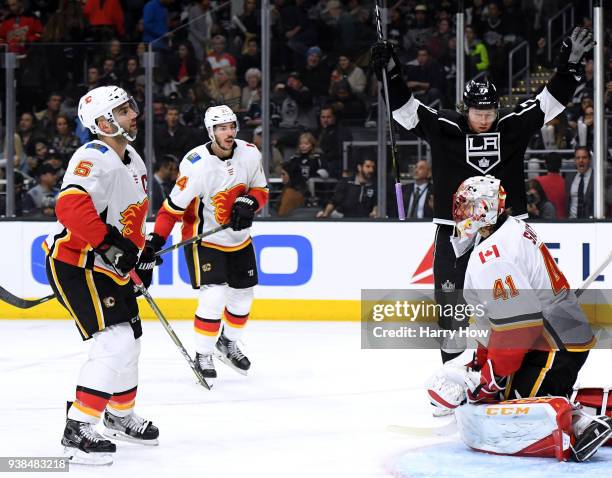 Tyler Toffoli of the Los Angeles Kings celebrates a goal from Dion Phaneuf, in front of Mike Smith, Mark Giordano and Travis Hamonic of the Calgary...