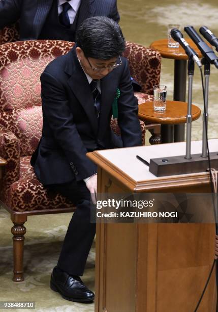 Nobuhisa Sagawa, former senior Finance Ministry official, attends an Upper House budget committee meeting to give a testimony in parliament in Tokyo...