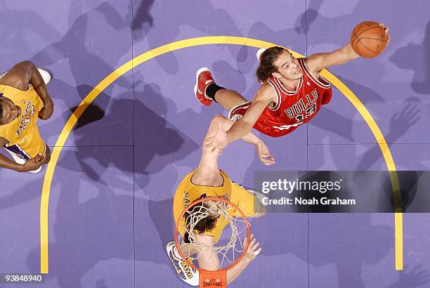 Joakim Noah of the Chicago Bulls rebounds against Pau Gasol of the Los Angeles Lakers during the game at Staples Center on November 19, 2009 in Los...