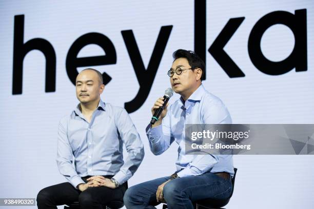 Yeo Min-soo, co-chief executive officer of Kakao Corp., right, speaks as Joh Su-yong, co-chief executive officer, left, looks on during a news...