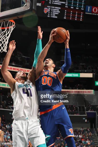 Enes Kanter of the New York Knicks goes to the basket against Willy Hernangomez of the Charlotte Hornetson March 26, 2018 at Spectrum Center in...