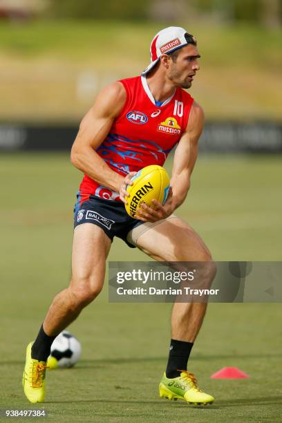 Easton Wood gathers the ball during a Western Bulldogs AFL training session at Whitten Oval on March 27, 2018 in Melbourne, Australia.