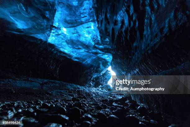 explorer of the ice cave - inner courage stock pictures, royalty-free photos & images