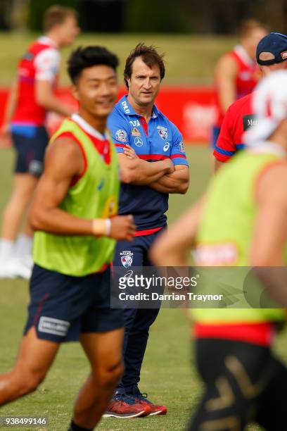 Luke Beveridge , Senior Coach looks on during a Western Bulldogs AFL training session at Whitten Oval on March 27, 2018 in Melbourne, Australia.