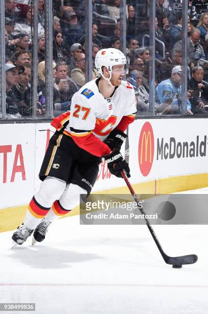 Dougie Hamilton of the Calgary Flames handles the puck during a game against the Los Angeles Kings at STAPLES Center on March 26, 2018 in Los...