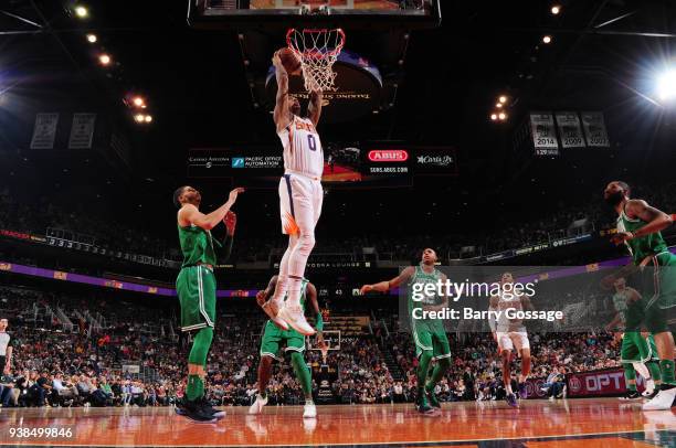 Marquese Chriss of the Phoenix Suns dunks against the Boston Celtics on March 26, 2018 at Talking Stick Resort Arena in Phoenix, Arizona. NOTE TO...