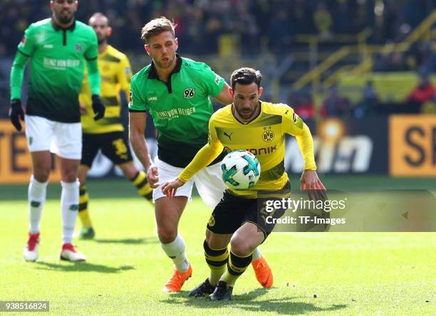 Niclas Fuellkrug of Hannover and Gonzalo Castro of Dortmund battle for the ball during the Bundesliga match between Borussia Dortmund and Hannover 96...