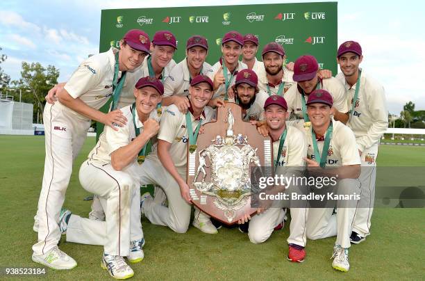 Queensland celebrate after winning the Sheffield Shield final during day five of the Sheffield Shield final match between Queensland and Tasmania at...