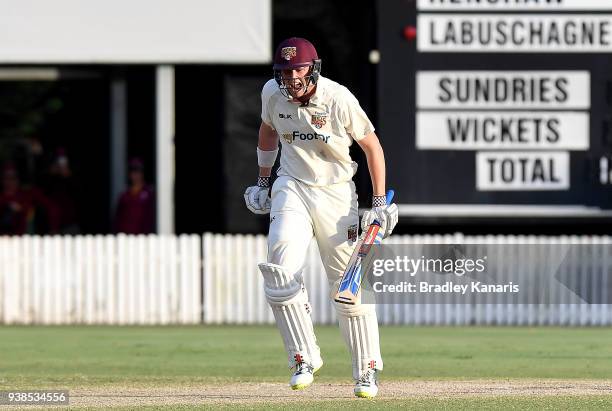 Matthew Renshaw of Queensland celebrates victory after hitting the winning runs during day five of the Sheffield Shield final match between...