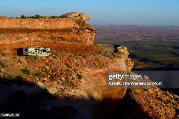 Part of State Route 261 is the Moki Dugway, a steep, three-mile graded dirt switchback road that is carved into the cliff edge of Cedar Mesa in Bears...