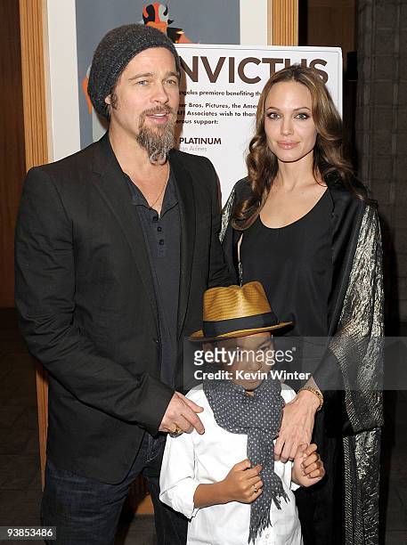 Actors Brad Pitt , Angelina Jolie and their son Maddox arrive at the premiere of Warner Bros. Pictures' and Spyglass Entertainment's "Invictus" at...