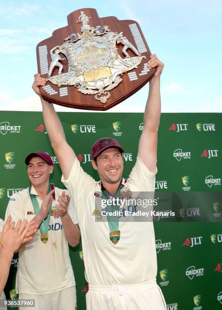 Luke Feldman of Queensland celebrates victory during day five of the Sheffield Shield final match between Queensland and Tasmania at Allan Border...