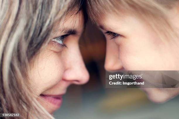 mother and daughter - face to face stock pictures, royalty-free photos & images