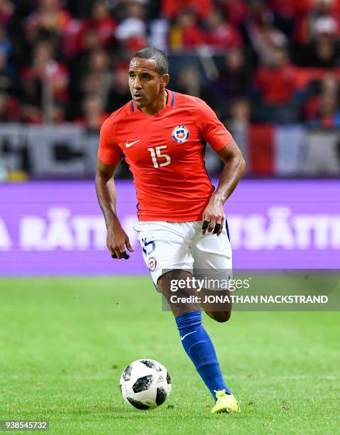 Chile's defender Jean Beausejour controls the ball during the international friendly football match between Sweden and Chile at Friends Arena in...