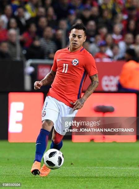 Chile's forward Eduardo Vargas controls the ball during the international friendly football match between Sweden and Chile at Friends Arena in Solna...