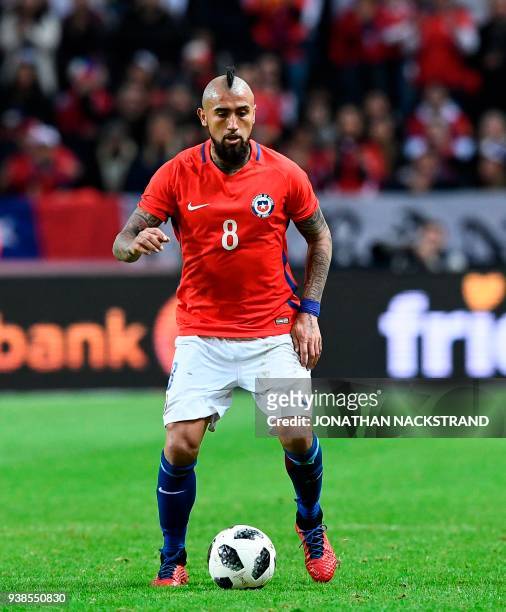 Chile's midfielder Arturo Vidal controls the ball during the international friendly football match between Sweden and Chile at Friends Arena in Solna...