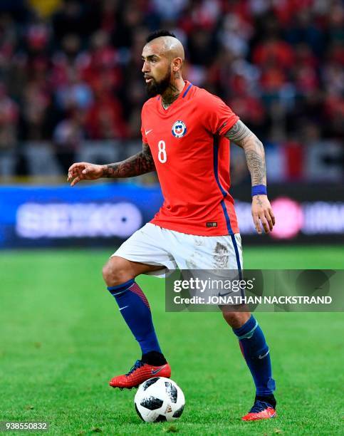 Chile's midfielder Arturo Vidal controls the ball during the international friendly football match between Sweden and Chile at Friends Arena in Solna...