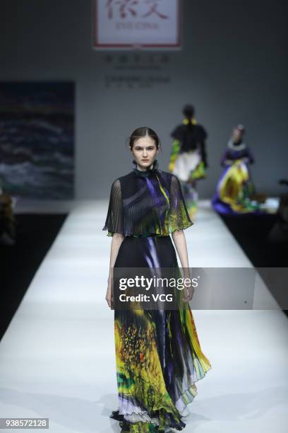 Model showcases designs on the runway at EVE CINA show on day two of Mercedes-Benz China Fashion Week Autumn/Winter 2018/2019 at 751D.PARK on March...