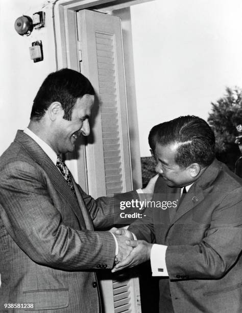 Photo dated 09 September 1973 of Syrian President Hafez al-Assad welcoming Prince Norodom Sihanouk in Damascus. AFP PHOTO