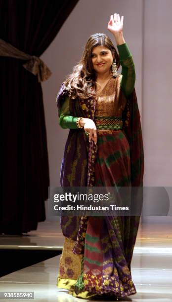 Bollywood singer Alka Yagnik walks the ramp in a silk tie-and-dye sari for designer friend Sucheta V Merh at Wills Lifestyle India Fashion Week 2008,...