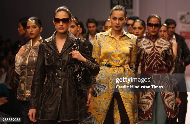 Models display creations of Raghavendra Rathore at Wills Lifestyle India Fashion Week, in New Delhi.
