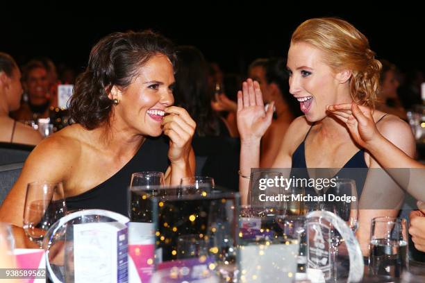 Emma Kearney of the Bulldogs reacts next to Kate Shierlaw on winning the AFLW Medal the 2018 AFW Awards at The Peninsula on March 27, 2018 in...