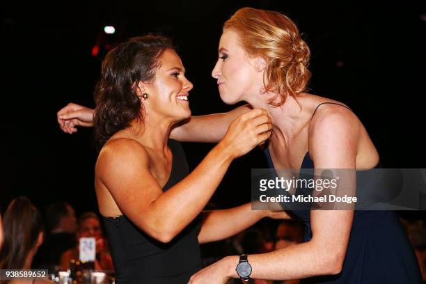 Emma Kearney of the Bulldogs is hugged by Kate Shierlaw on winning the AFLW Medal the 2018 AFW Awards at The Peninsula on March 27, 2018 in...