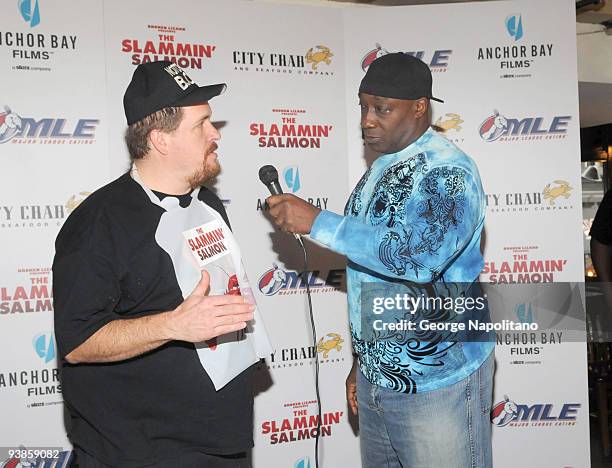 Competitive eater Bob Shoudt is interviewed by actor Michael Clarke Duncan as the winner of the salmon chowder eating contest for "The Slammin'...