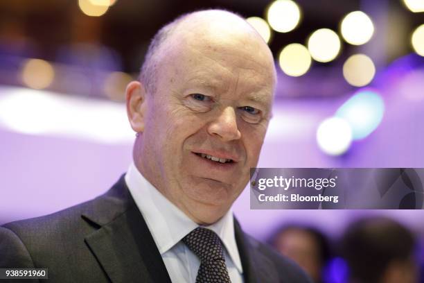 John Cryan, chief executive officer of Deutsche Bank AG, poses for a photograph during the European Banking Congress on the final day of Frankfurt...