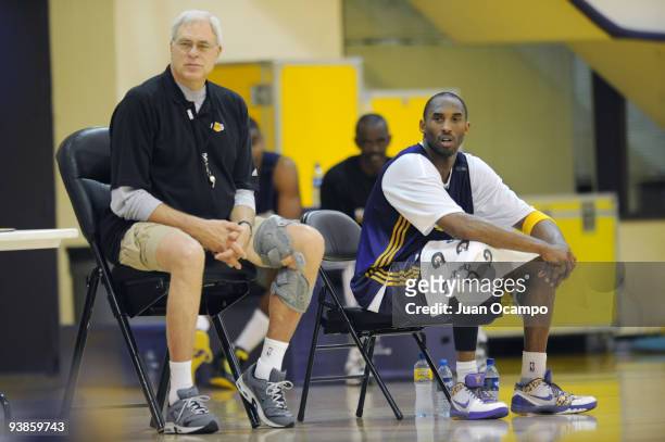 Los Angeles Lakers head coach Phil Jackson and Kobe Bryant look on during practice on December 3, 2009 at Toyota Sports Center in El Segundo,...