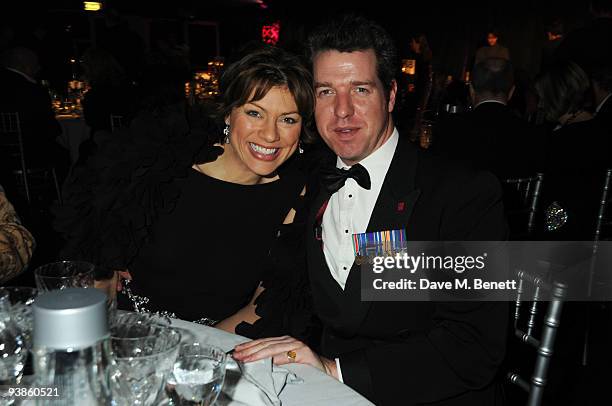 Kate Silverton and guest attends The Berkeley Square Christmas Ball held at Berkeley Square on December 3, 2009 in London, England.