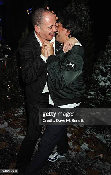 Dinos Chapman and Giorgio Locatelli and guest attends The Berkeley Square Christmas Ball held at Berkeley Square on December 3, 2009 in London,...