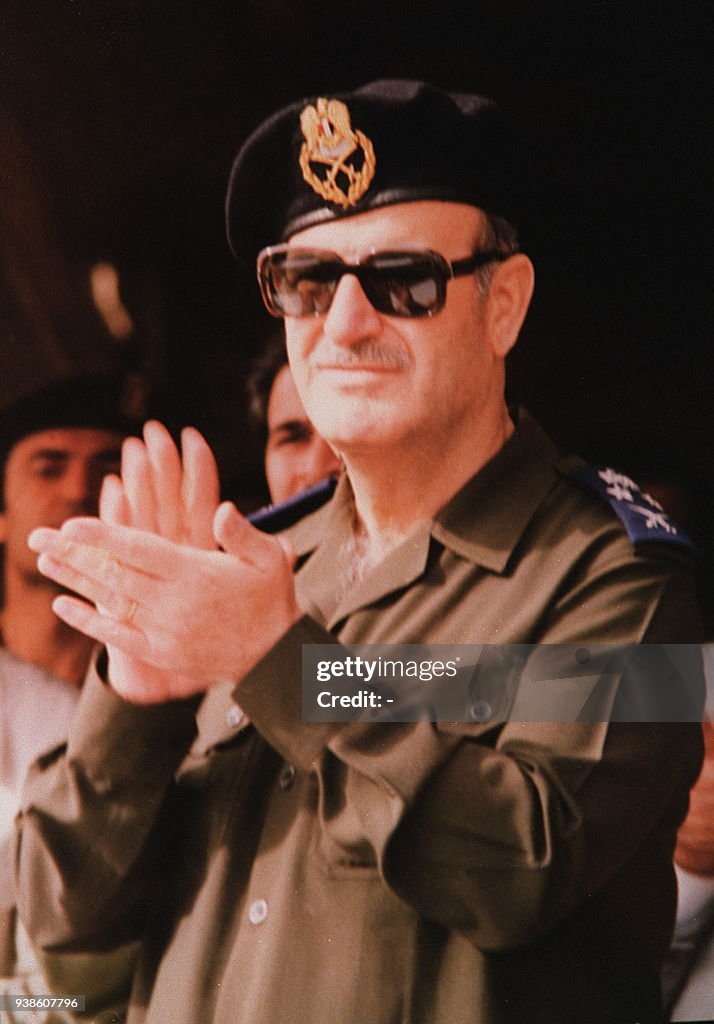 Hafz R Photo dated 1980 shows late Syrian President Hafez al-Assad atteding ...
