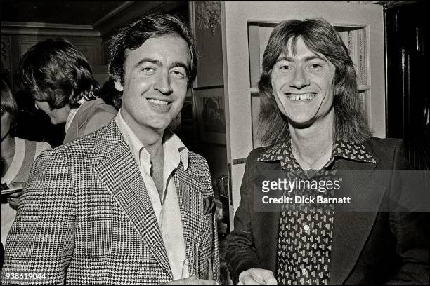 Record producer and songwriter Mike Hurst with songwriter Rod Lynton at a party in London circa 1975.