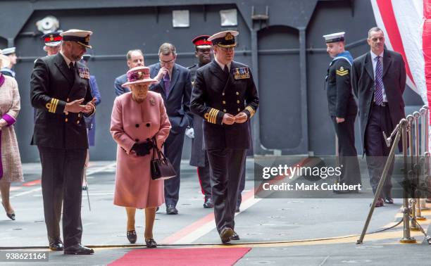 Queen Elizabeth II onboard HMS Ocean after being driven on in her official Range Rover at the decommissioning ceremony for HMS Ocean on March 27,...