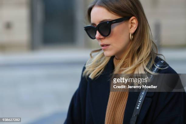 Maike Schmitz from Shoppisticated details from the Valentino sunglasses on January 08, 2018 in Hamburg