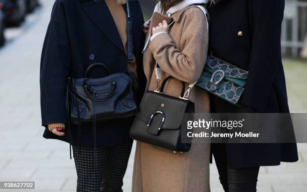 Maike Schmitz, Sonja Paszkowiak, Kira Tolk from Shoppisticated details of the Balenciaga, Aigner Munich and Gucci bag on January 08, 2018 in Hamburg