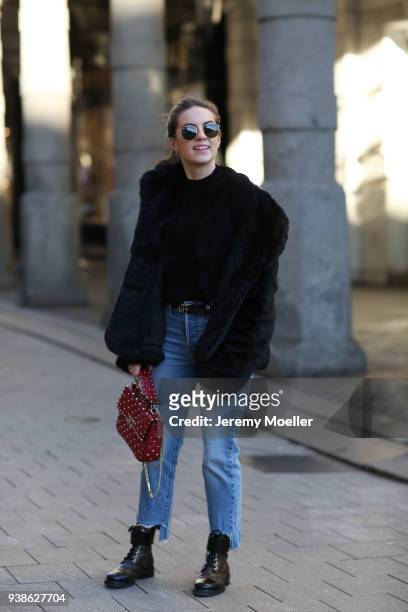 Sonja Paszkowiak from Shoppisticated wearing a &other Storie jacket, Valentino bag, shades from Ray Ban, Levis Jeans and Louis Vuitton boots on...