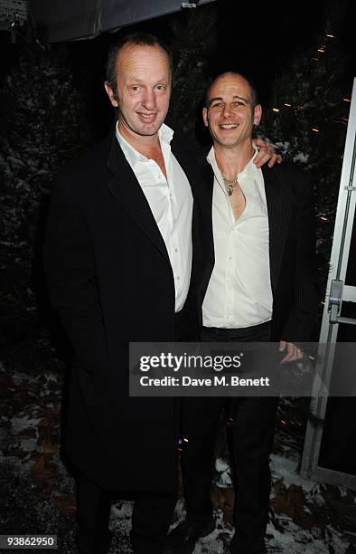 Johnny Shakid and Dinos Chapman attends The Berkeley Square Christmas Ball held at Berkeley Square on December 3, 2009 in London, England.