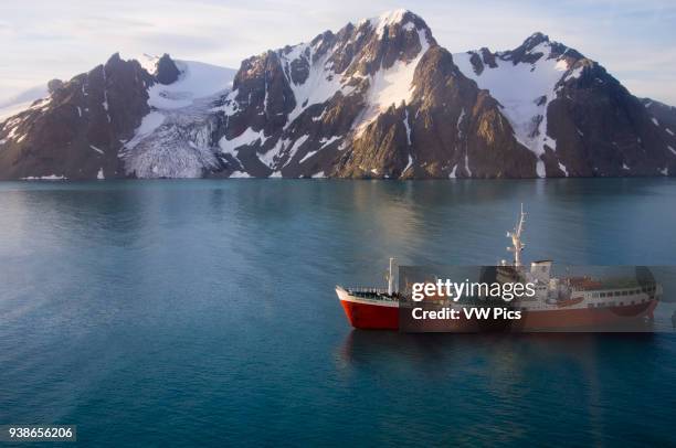 Antarctica, South Shetland Islands, Livingston Island, False Bay, Helicopter flight on Huntress Glacier. Antarctic Dream ship.