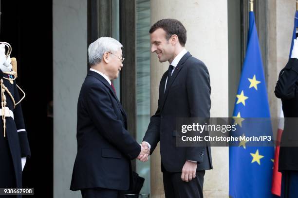 French President Emmanuel Macron welcomes Vietnamese Communist Party chief, Nguyen Phu Trong at Elysee Palace on March 27, 2018 in Paris, France....
