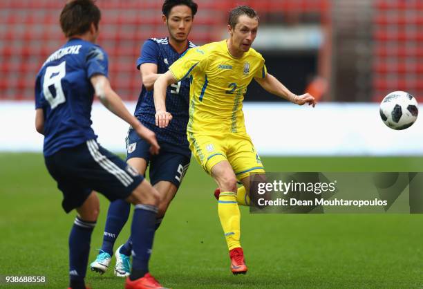 Bohdan Butko of Ukraine and Kenyu Sugimoto of Japan in action during the International Friendly match between Japan and Ukraine at Stade Maurice...